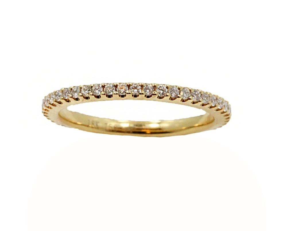 18K Yellow Gold Eternity Band With 46 Round Brilliant Cut Diamonds at a Total Weight of .40 Carats. This Eternity Band Is a Size 6.5.