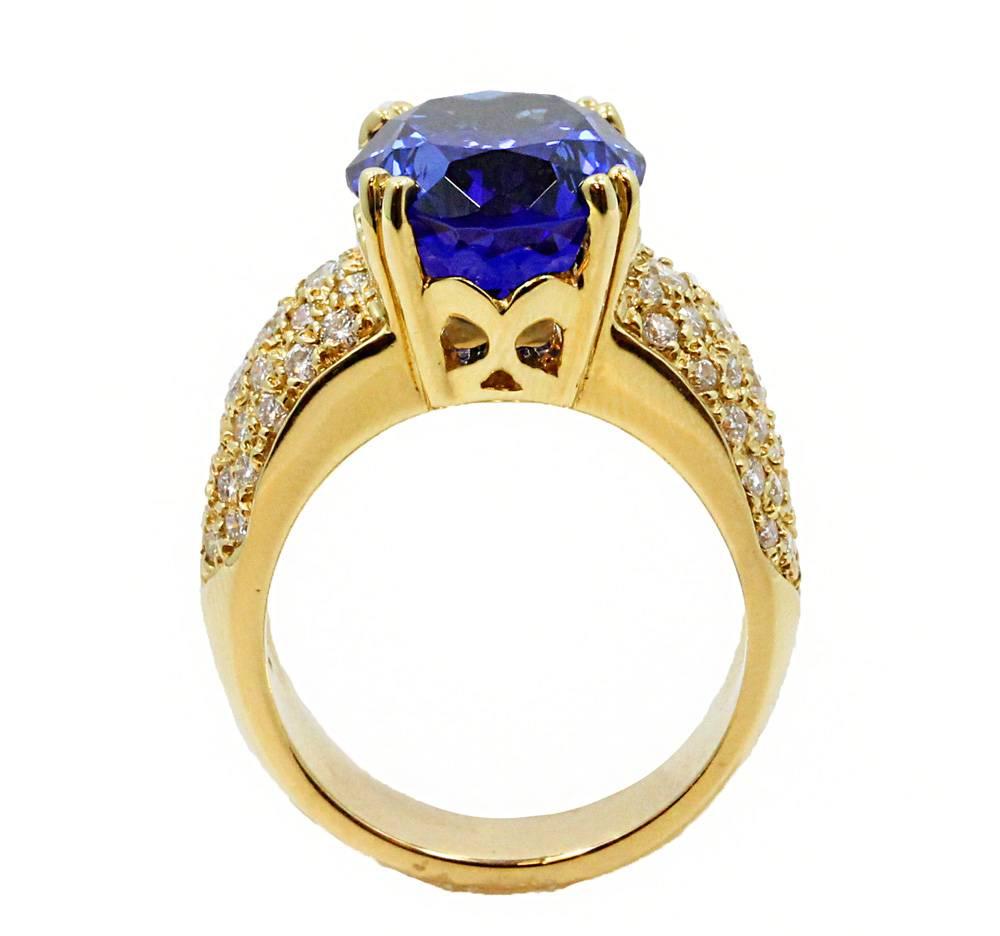 18K Yellow Gold Ring With Tanzanite Weighing 12.81ct and 56 Diamonds Weighing 2.0ct With F-G Color and VS Clarity