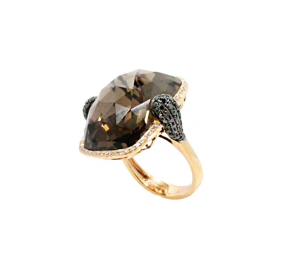 18K Rose Gold Ring With Center Smokey Quartz Weighing 34.90ct Black Diamonds Weighing .73ct and White Diamonds Weighing 0.20ct