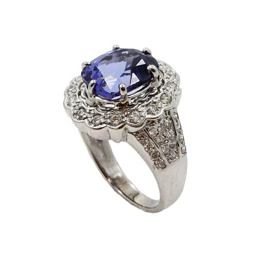 18K White Gold Ring With Center Tanzanite Stone and Round Diamonds Weighing 1.0ct In a Size 7.5