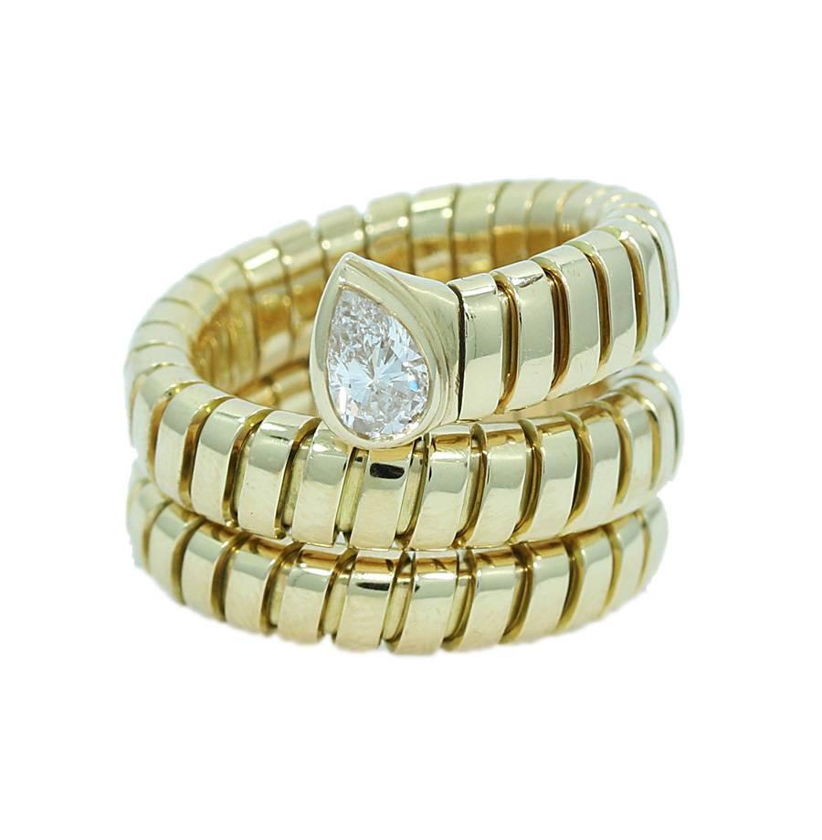 Bulgari Tubogas Gold Coil Snake Ring with Pear Shaped Diamond In Excellent Condition For Sale In Naples, FL