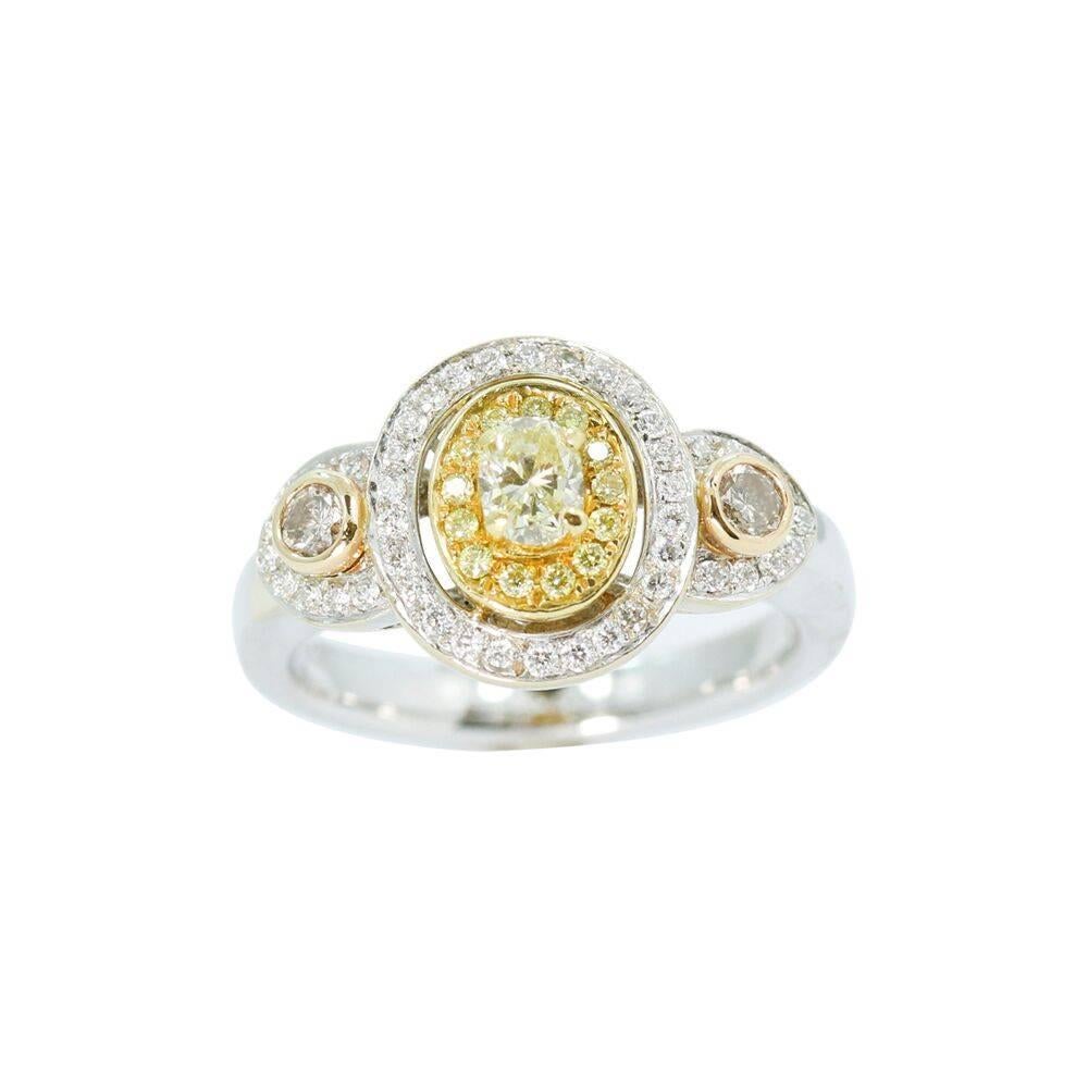 Up for sale is this beautiful 18k white and yellow gold D'Yach diamond ring with approximately sixty one (61) diamonds. The diamonds weigh approximately 1.25 carats total weight. Ring sits at a size 7 and can be easily sized. It measures 1.0"