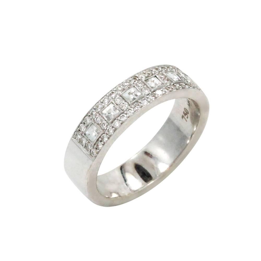 18K White Gold Bez Ambar Part Way Windows Band With 7 Blaze Diamonds at a Total Carat Weight of 0.33ct and Surrounding Pave Diamonds With a total Carat Weight of 0.35ct. This Band Is a Size 6.5.