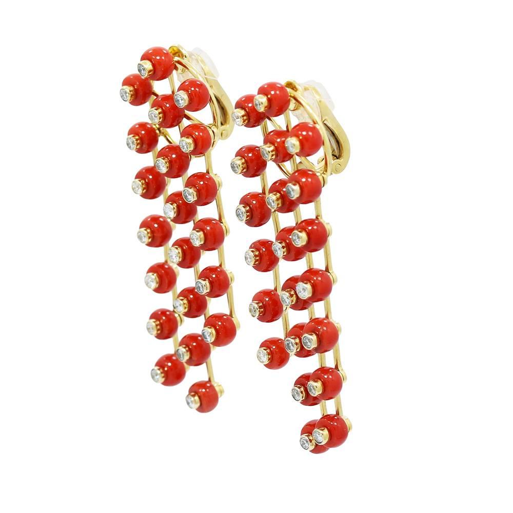 We have these beautiful 18k yellow gold beaded dream catcher earrings with mediterranean coral. Diamonds weigh approximately 1.70 carats total weight. They measure 2.5" in height with a total weight of 25.2 grams. The earrings are in excellent