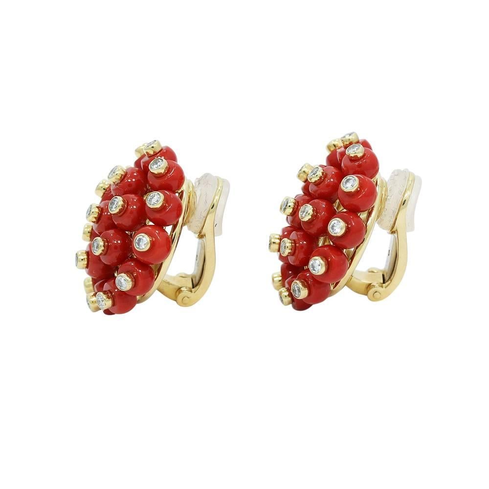 We have these beautiful 18k yellow gold earrings with mediterranean coral. Diamonds weigh approximately 1.52 carats total weight. They measure 1.0" in height with a total weight of 26.4 grams. The earrings are in excellent condition. Please see