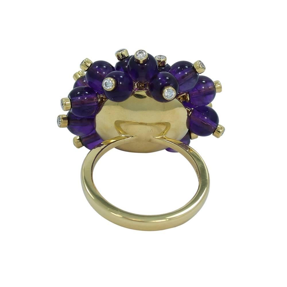 Up for sale is this 18k yellow gold amethyst beaded ring. The diamonds weigh approximately .92 carats total weight. Ring sits at a size 6.75 and can be easily sized. It weighs a total of 16.7 grams. The ring is in great condition. It is stamped with