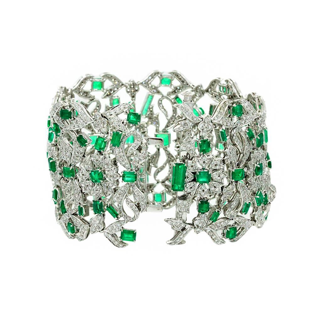 18K White Gold Bracelet With Emeralds Weighing A Total Carat Weight Of 48.98ct And Diamonds Weighing A Total Carat Weight Of 9.48ct. This Bracelet Is 7 Inches In Length.