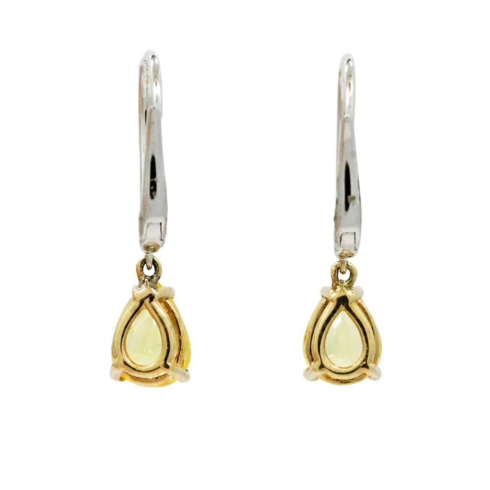 14K White And Yellow Gold Earrings With Diamonds Weighing A Total Carat Weight Of 0.10ct And Pear Shaped Yellow Sapphires Weighing A Total Carat Weight Of 2.31ct G-H COlor And VS2-SI1 Clarity. 