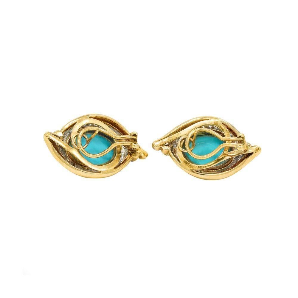 We have these beautiful 18k yellow gold turquoise and diamond earrings for sale with seventy (70) diamonds weighing approximately .70 carats total weight. They measure 1.625" in height and weigh a total of 24.4 grams. These earrings are in good