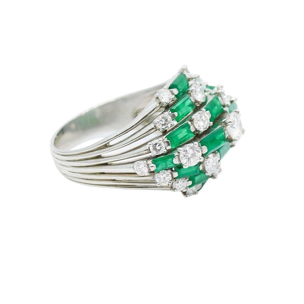 Up for sale is this platinum emerald and diamond ring. It has approximately 2.00 carats total weight in diamonds and baguette emeralds. It measures 1.25" in height and weighs a total of 17.5 grams. The size of the ring is a 10 and can be easily