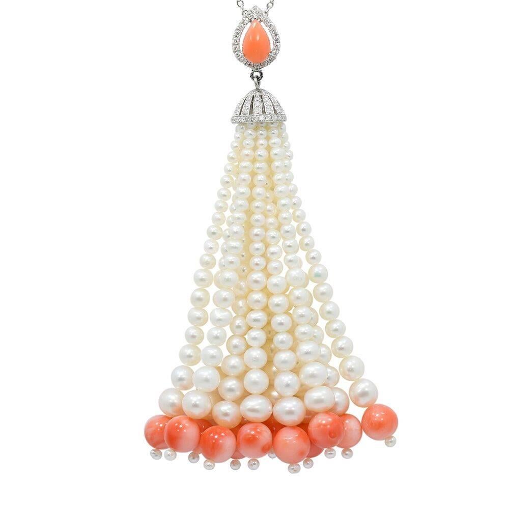 Up for sale is this beautiful 18k white gold necklace and tassel. The chain has peach coral and white sapphires. The tassel has diamonds that weigh 0.64 carats total weight, peach coral weighs 30.33 carats total weight, and fresh water pearls. It