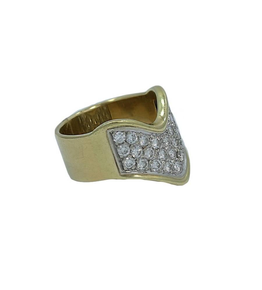 We have this 18k white and yellow gold diamond "V" shape pave ring. It has three (3) rows of round brilliant cut diamonds. The twenty seven (27) diamonds weigh approximately 2.00 carats total weight. The ring sits at a size 9.75 and can be