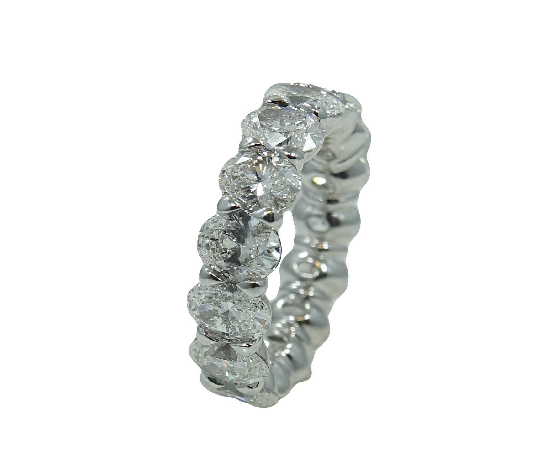 Platinum Eternity Band With 15 Oval Cut Diamonds Weighing A Total Carat Weight Of 7.38ct in Buttercup Mounting. This Ring Is A Size 6.5.