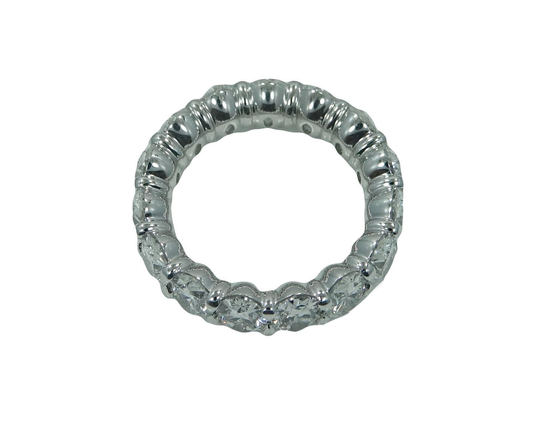  7.38 Carat Oval Cut Diamond Platinum Eternity Band Ring In New Condition For Sale In Naples, FL