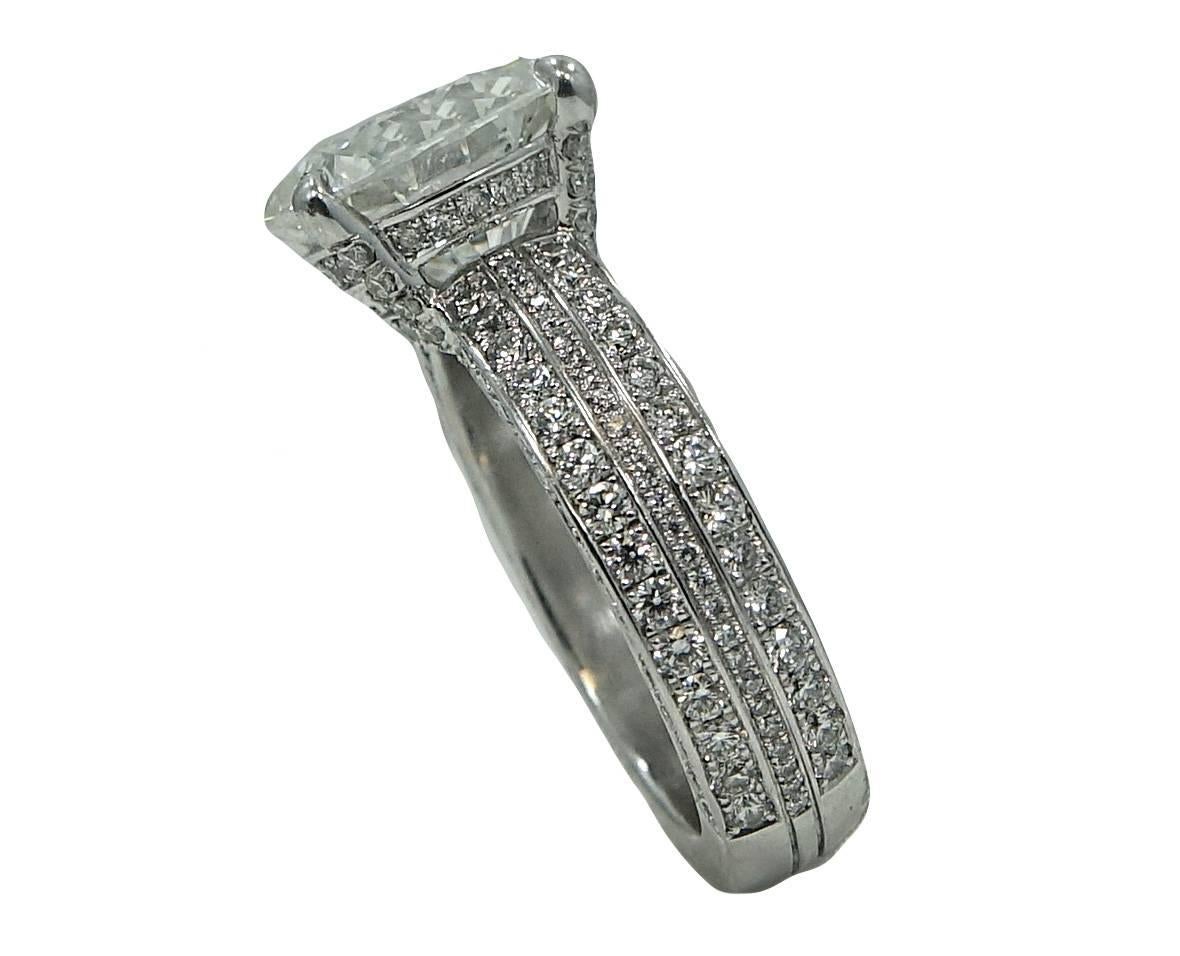  Platinum Ring With Center Round Brilliant Cut Diamond Weighing A Total Carat Weight Of 5.13ct With I Color And SI1 Clarity (GIA Report #: 1172104854) Three Rows Of Diamonds Cover The Sides Of The Mounting Weighing A Total Carat Weight Of 1.46ct.