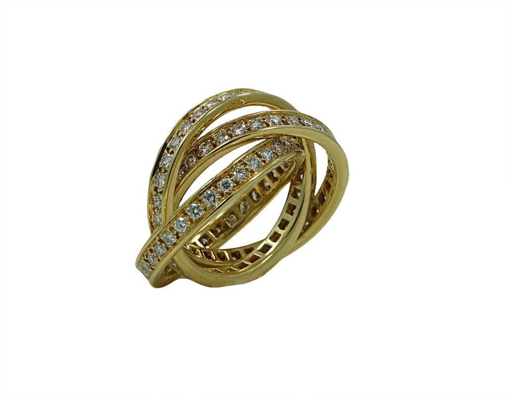18K Cartier Yellow Gold Trinity Ring With Diamonds Weighing a Total Carat Weight Of 1.70ct. This Ring Is A Size 5.5.