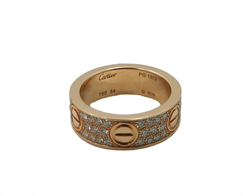18K Rose Gold Cartier Love Band With 66 Round Diamonds Weighing A Total Carat Weight Of .70ct. This Ring Is A Size 7.