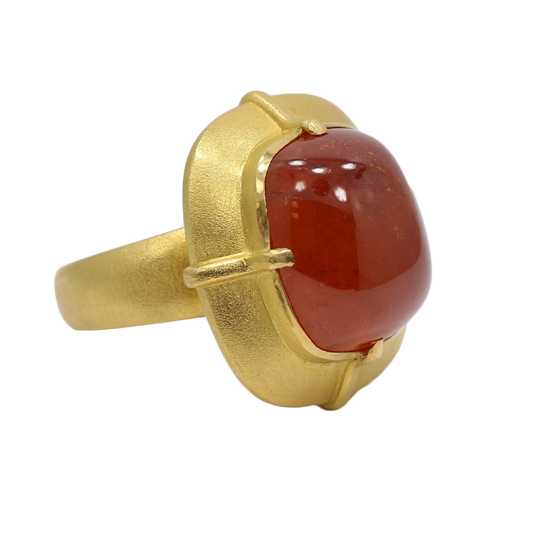 We have this C.Tyler 22k yellow gold mandarin garnet (cayan collection) ring. It measures 1.25" in height and weighs a total of 16.5 grams. The ring sits at a size 6.25 and can be adjusted. The ring is in great condition. Please see all