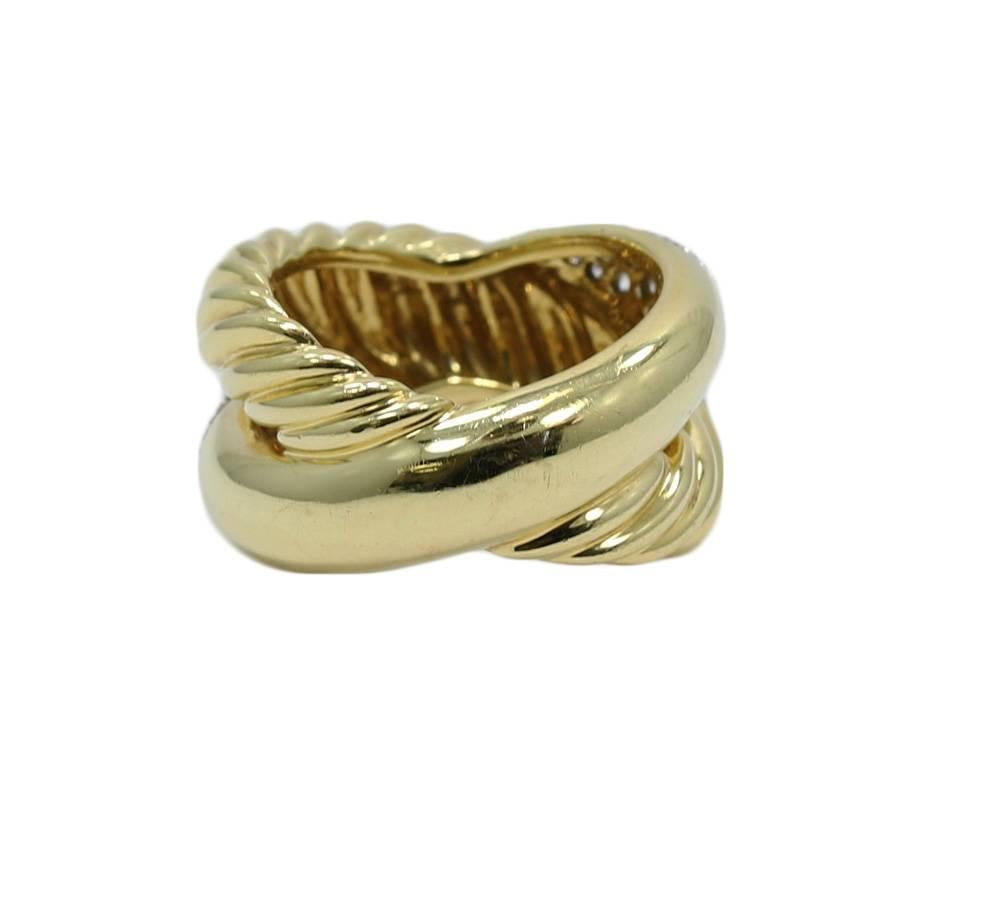 David Yurman 18k yellow gold Cable ring with pave diamonds. The diamonds weigh approximately 0.60 carats total weight. The ring is a size 6 and can be easily sized. It weighs a total of 11.2 grams. It is stamped DY 750. It is in excellent 