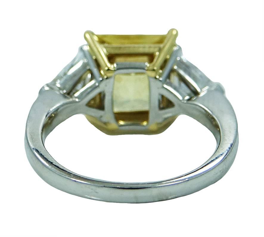 Women's White Gold Ring with 5.16 Carat Yellow Sapphire and Two Trillion Diamonds For Sale