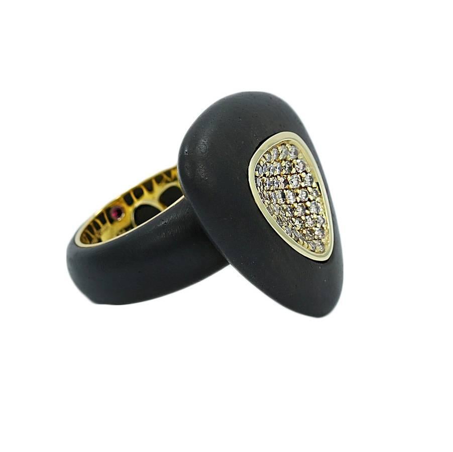 Roberto Coin Silver Ring Capri Plus Ebony Wood and Diamond. The diamonds weigh approximately 0.90 carats total weight. It measures 1.25 inches in height and weighs a total of 9.3 grams. The ring sits at a size 6.5.  It is stamped with Roberto Coin