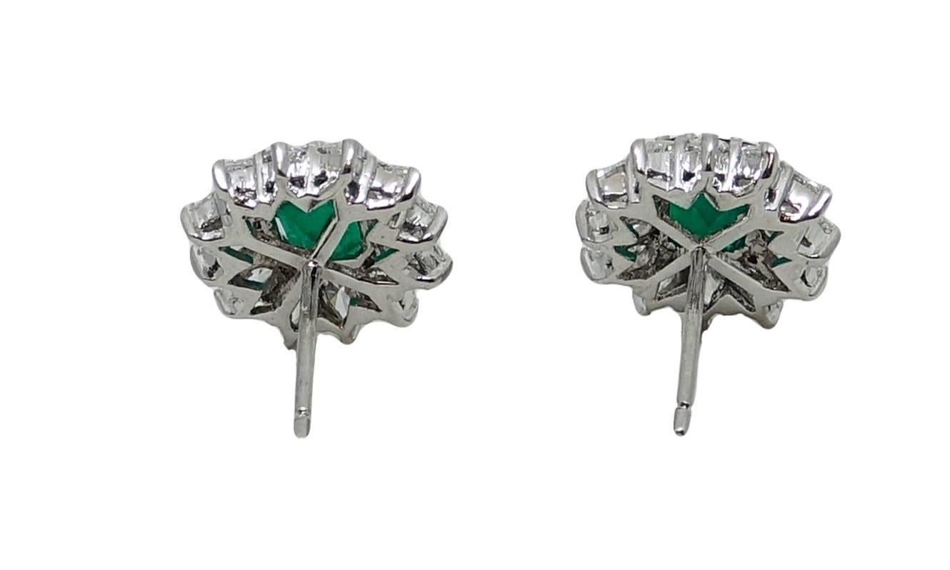 18K White Gold Earrings With 2 Colombian Emeralds Weighing A Total Carat Weight Of 3.34ct and 24 Pear Shaped Diamonds Weighing A Total Carat Weight Of 3.84ct G-H Color VS1-VS2 Clarity. 