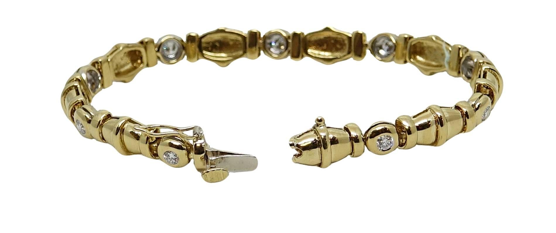 18K Yellow Gold Bracelet With Diamonds Weighing A Total Carat Weight Og .90ct H-I Color VS-SI Clarity. This Bracelet Is 7 Inches In Length.