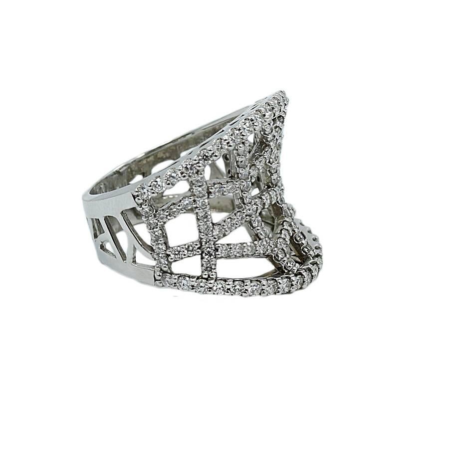 14k white gold abstract diamond ring. The diamonds are  F-G in color and VS-SI in clarity weighing 1.50 carats total weight. The ring is a size 7 and weighs a total of 7.4 grams. The ring is in excellent condition.