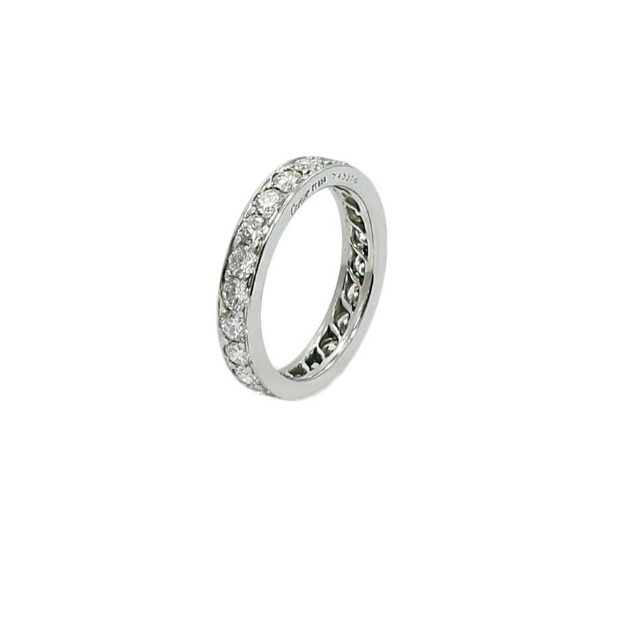 Cartier diamond eternity platinum band with round diamonds. It has 22 diamonds F-G/VS weighing approximately 1.50 carats total weight. The ring sits at a size 6 and weighs a total of 5.0 grams. The ring is in excellent  condition.