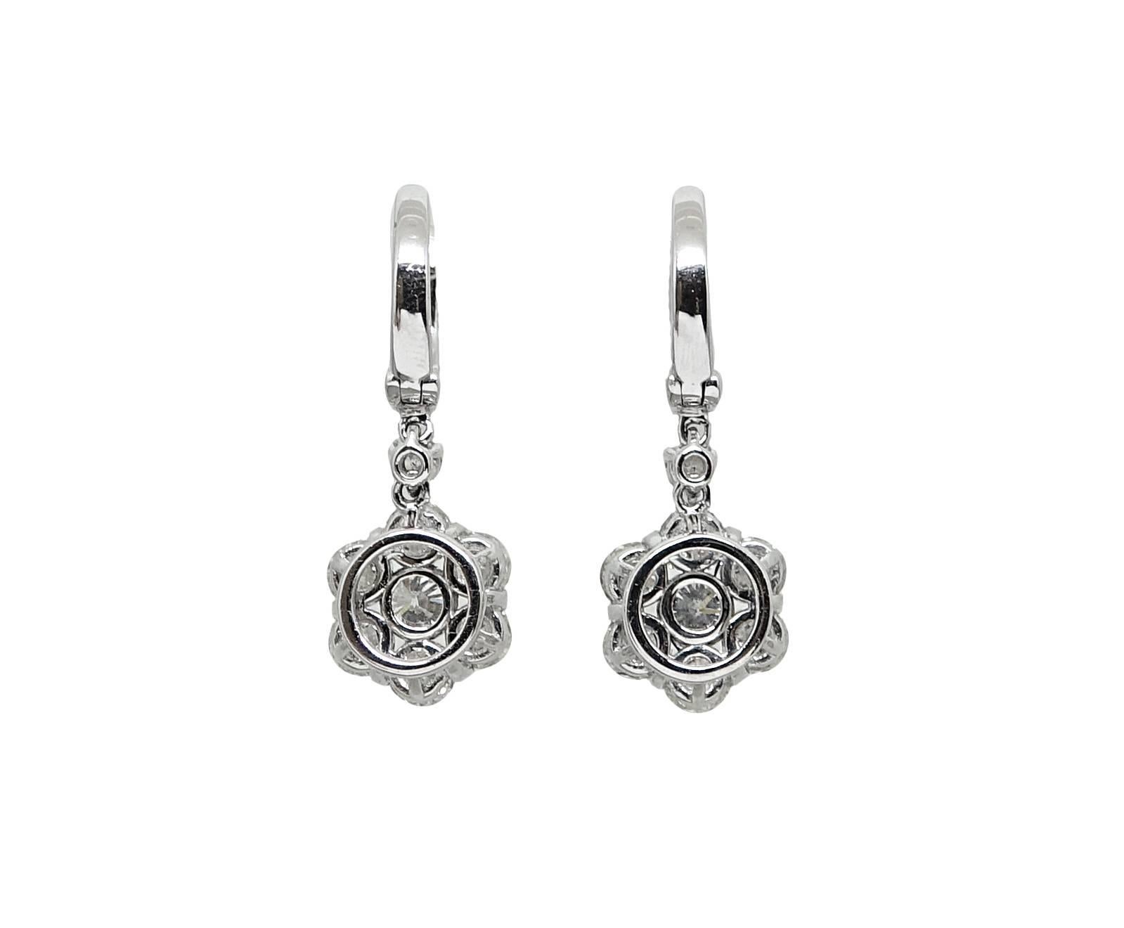 These 18K White Gold Dangling Earrings With Diamonds Weighing A Total Carat Weight Of 3.43 Carats. These Earrings Measure An Inch In Length.
