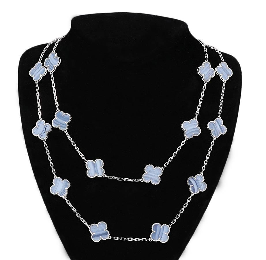 Van Cleef and Arpel 18k white gold Alhambra long necklace with 20 Chalcedony Motifs. The necklace measures 33.5 inches in length and weighs a total of 49.5 grams. The necklace is in excellent condition..