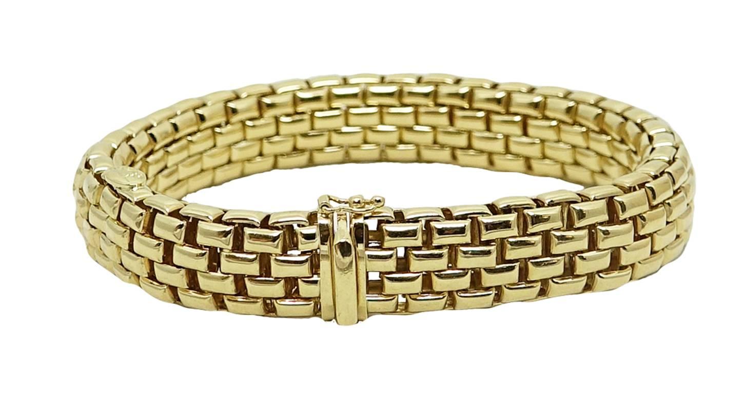 18K Yellow Gold Flexible Fope Wide Bracelet. This Bracelet Is  7 Inches and in excellent condition.