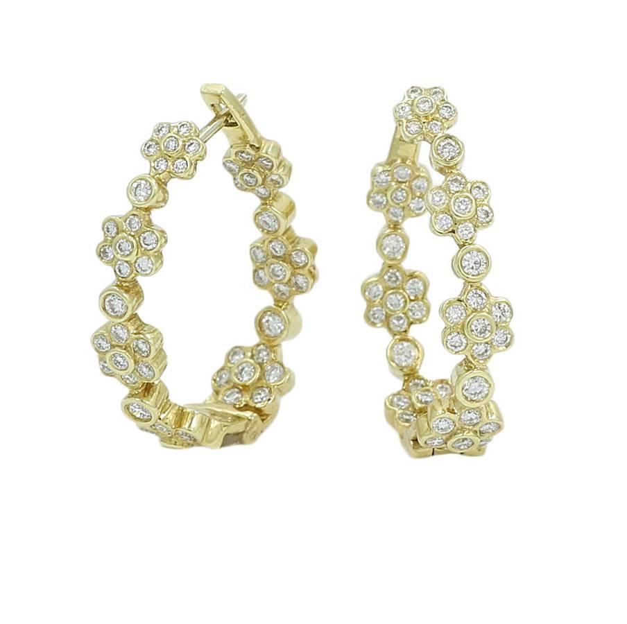 18k yellow gold diamond flower hoop earrings. The 108 diamonds weigh 1.08 carats total weight. They measure 1.00 inch in height and weigh a total of 9 grams. The earrings are in excellent condition.