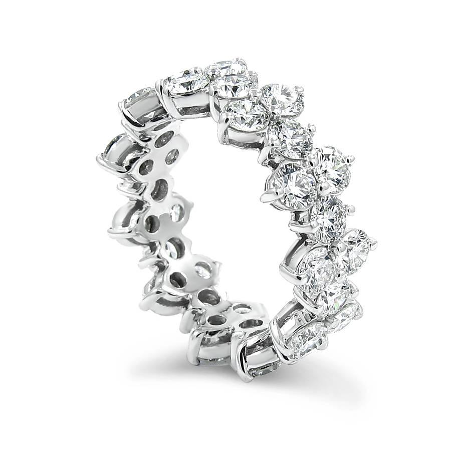 18k white gold ladies three row eternity band with 33 prong set round diamonds equaling 4.69ctw with F-G in color and VS-SI in clarity. Ring sits at a size 6.50.