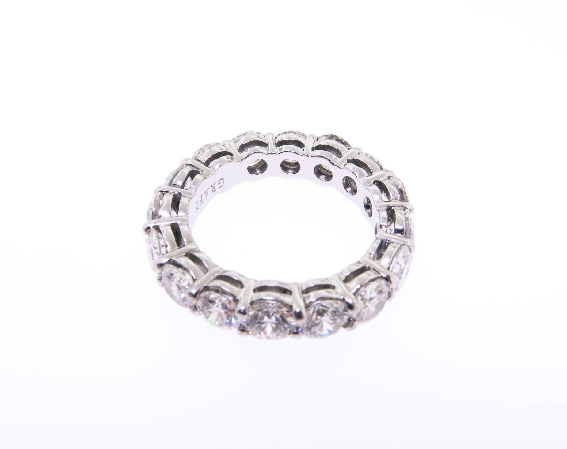 A perfect line of round brilliant cut Diamond eternity band, showcasing fine colorless diamonds shared prong-set in Platinum. Sixteen diamonds weighing 5.15 total carats (H-color/VS1-clarity). 4.5 mm width band. Size 5.5. GIA certified.