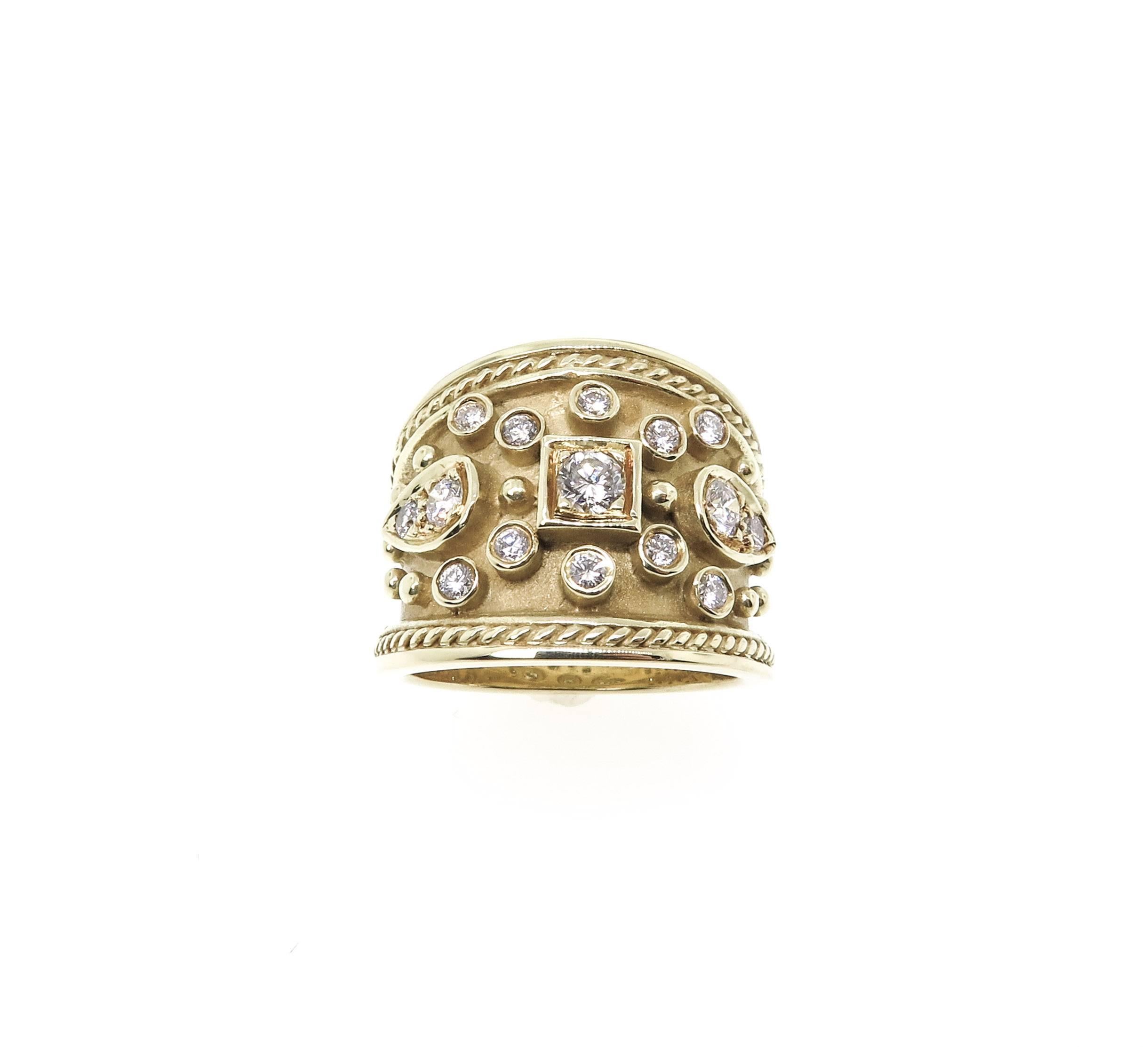 This exquisite ring from Dilaro with two beautiful finishes in high polish perfection acsentuated by silky satin finish in 18kt yellow gold, sharply defined by emerging diamonds in a beautiful filigree pattern. Total weight in diamonds 0.50ct. Size