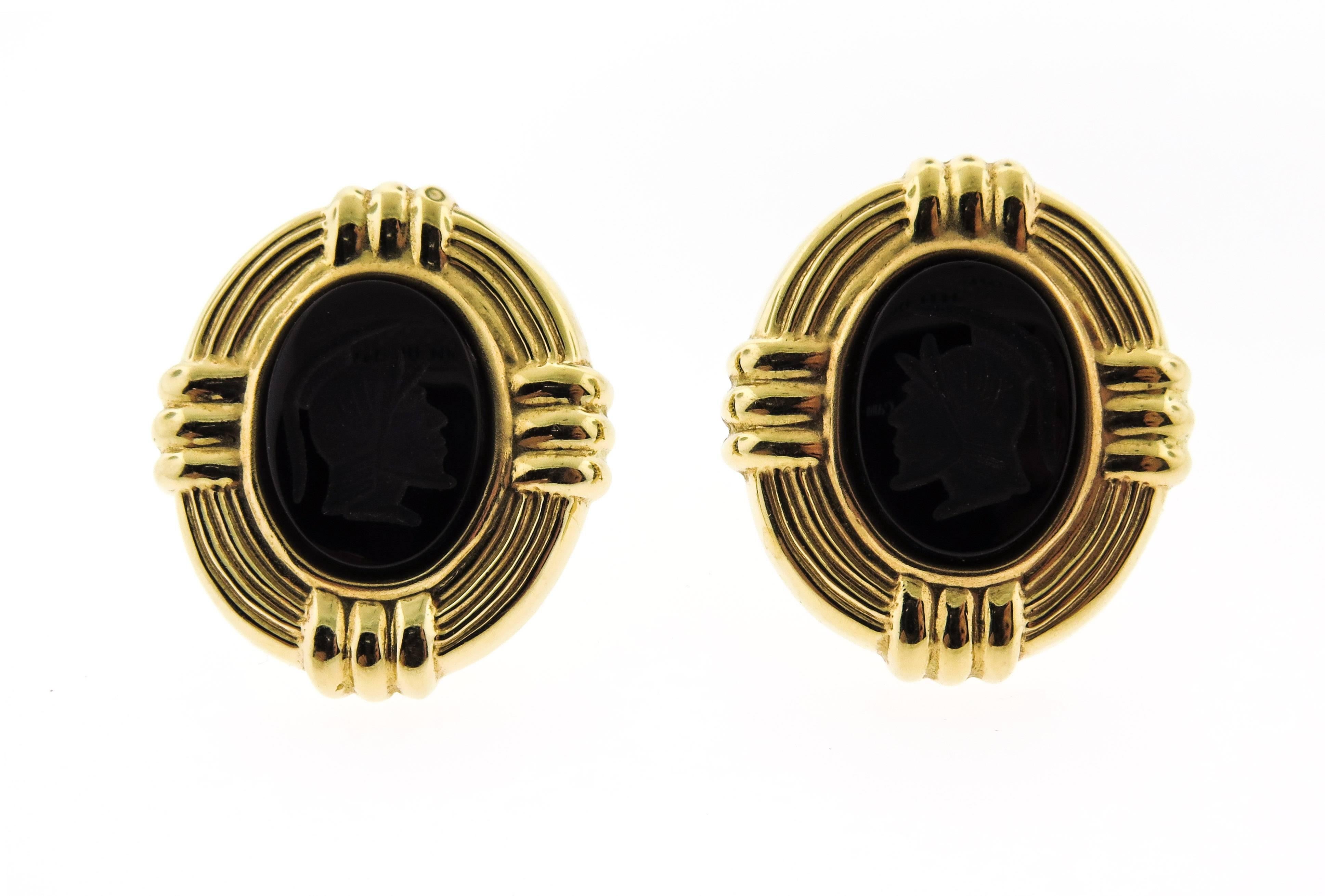 These unique earrings have a nice oval shape, each of which features a 13mm x 17.8mm genuine onyx stone. The onyx features a polished surface and has been carved in an intaglio style, depicting the bust of an ancient soldier wearing a helmet. The