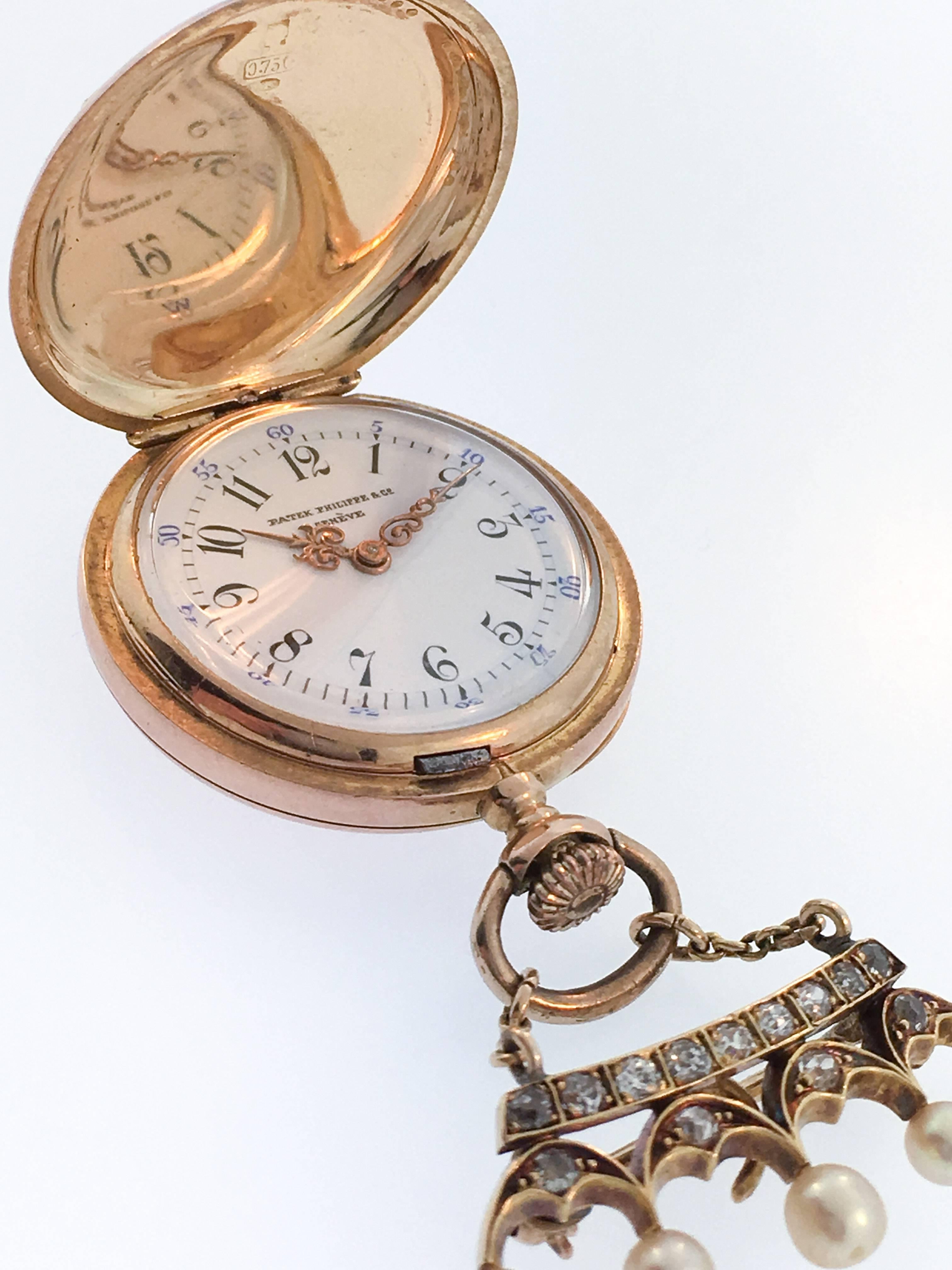 Patek Philippe Lady's Pocket Watch adorned with seed pearls and a diamond. The watch features a pin with a crown with 5 pearls and diamonds (Crown of Count). The watch dates early XXth Century. Case, dial, hands and movement are 100% Patek Philippe