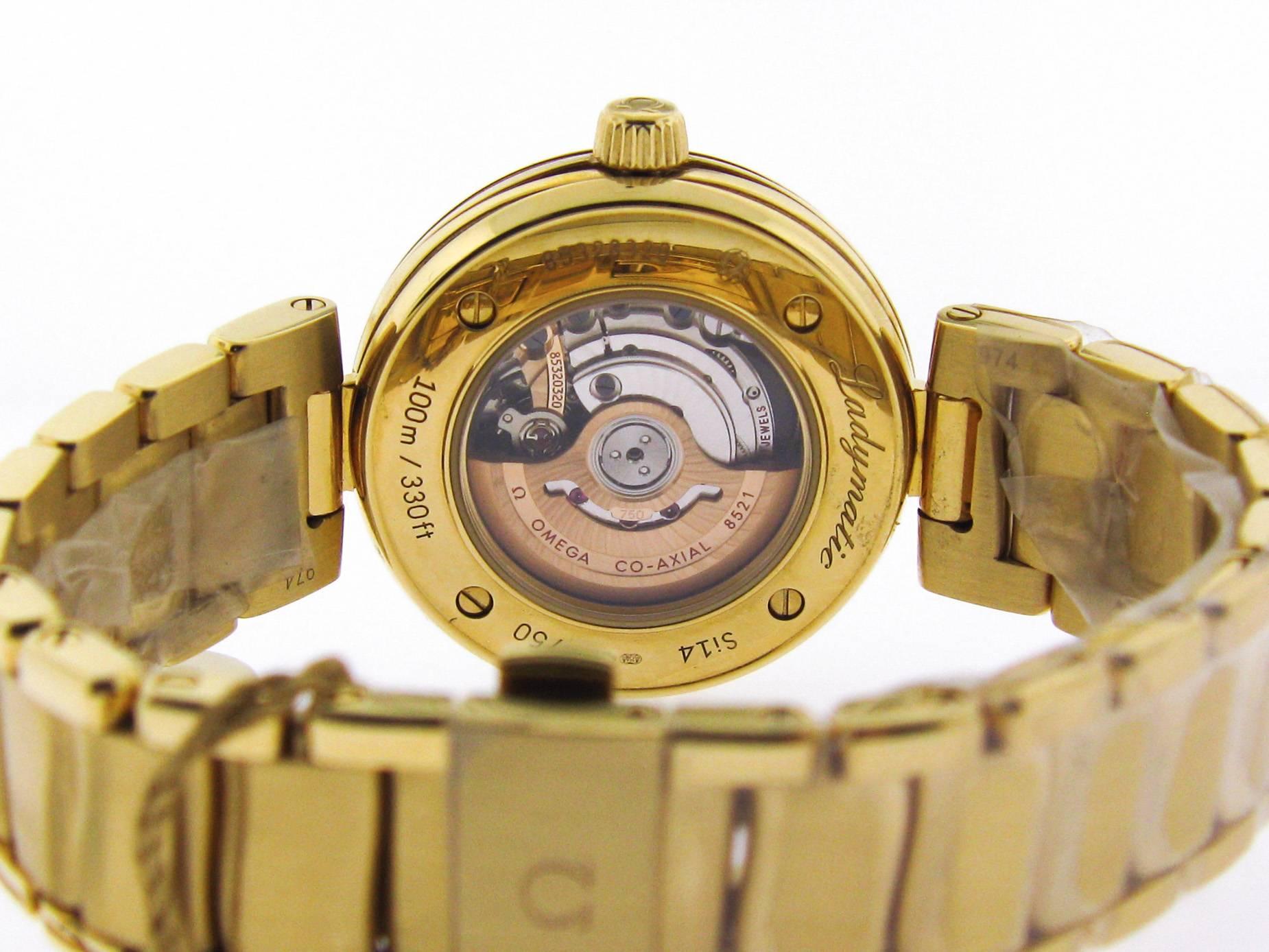 Moderne Omega Montre-bracelet automatique Ladymatic en or jaune pour femmes