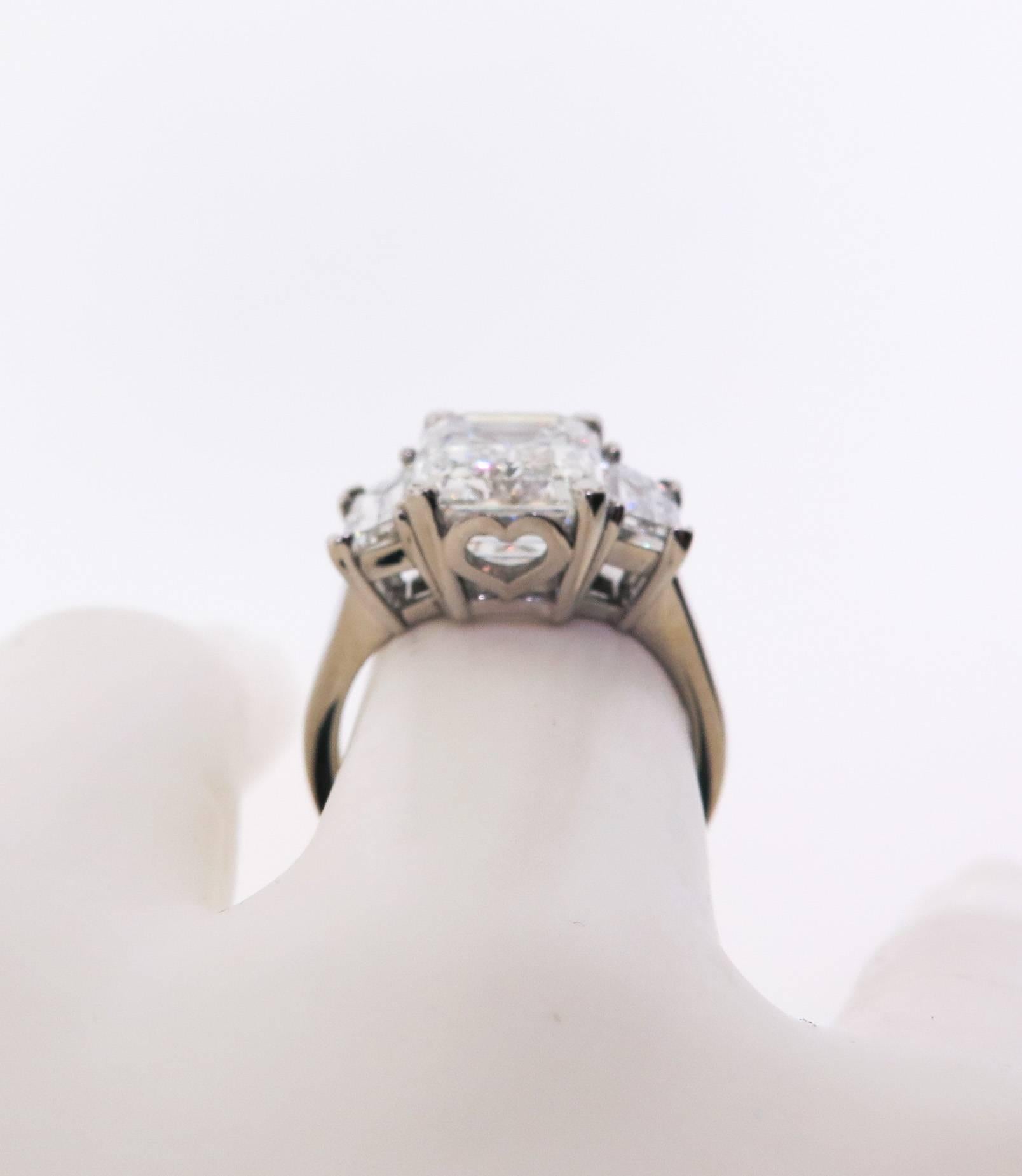 Women's GIA Certified 5.47 carats Emerald Cut Diamond and Trapezoids Platinum Ring