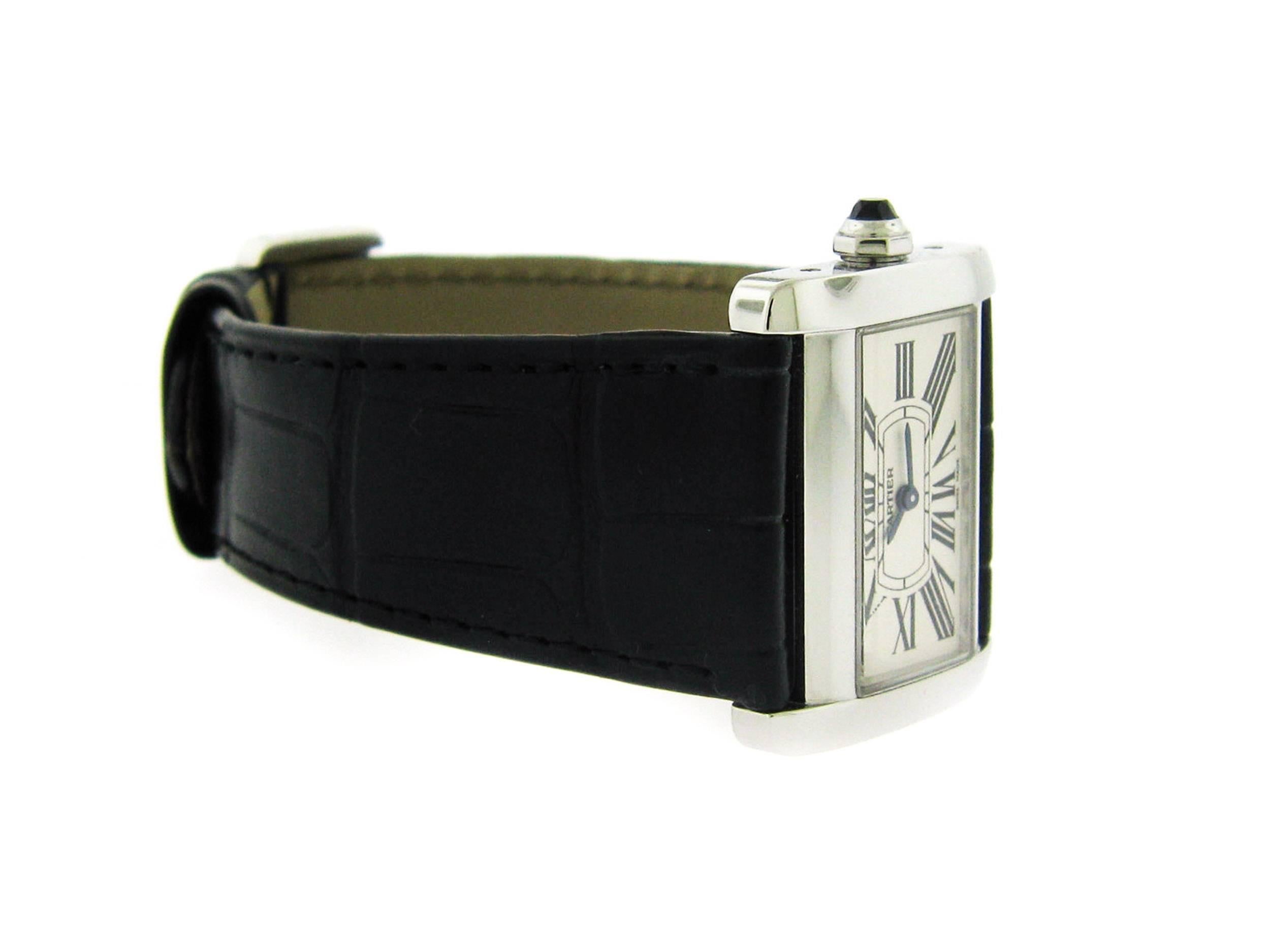 Cartier Tank Divan crafted in stainless steel.  This timepiece features a quartz movement with indications for the Hours and Minutes.    We have the watch only.  No box or papers.

