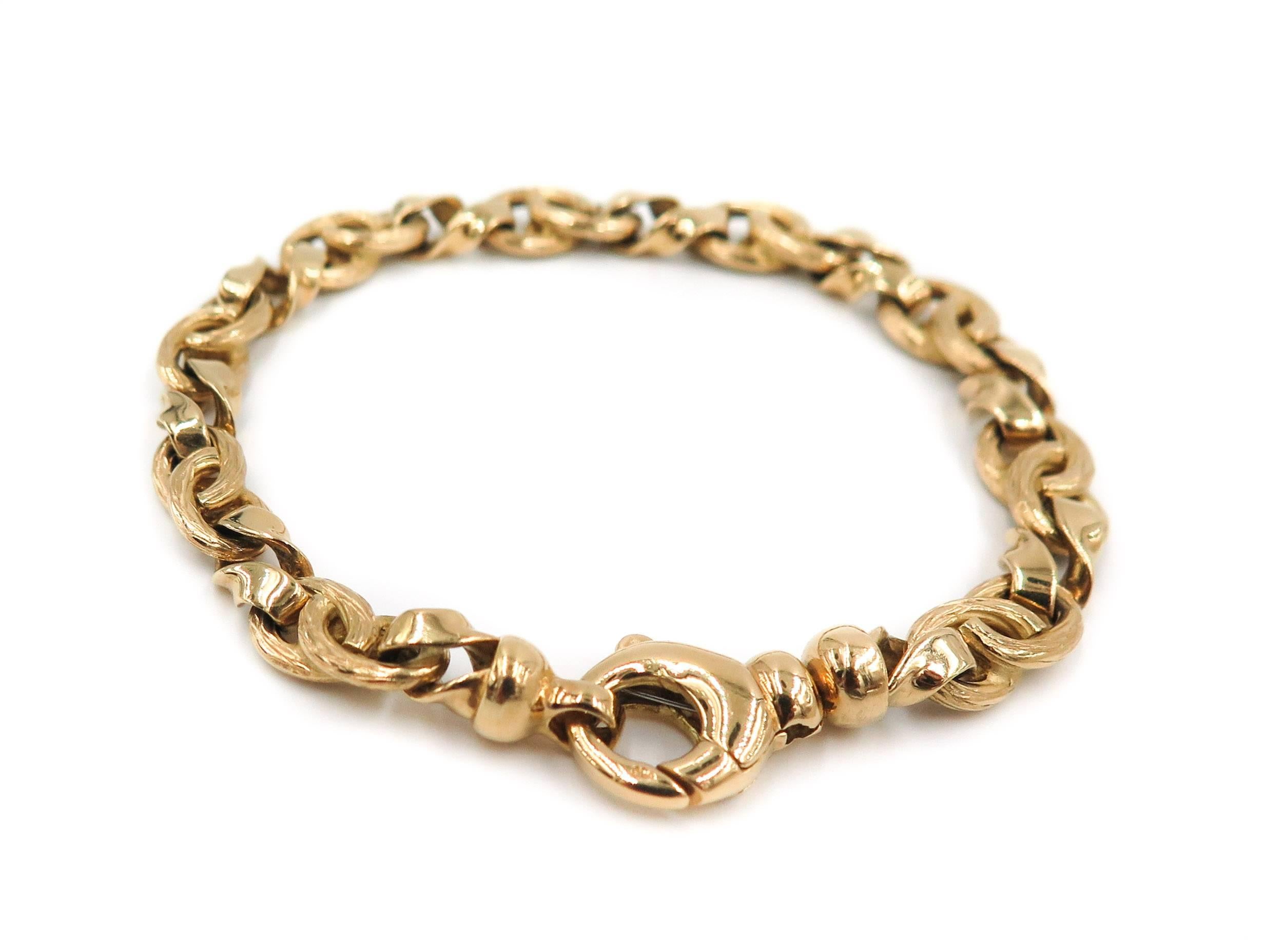 Bold... gold bracelet. Brushed and textured alternating with polished and shiny twisted links. 7.25 inches long and weights 30.10 grams.
