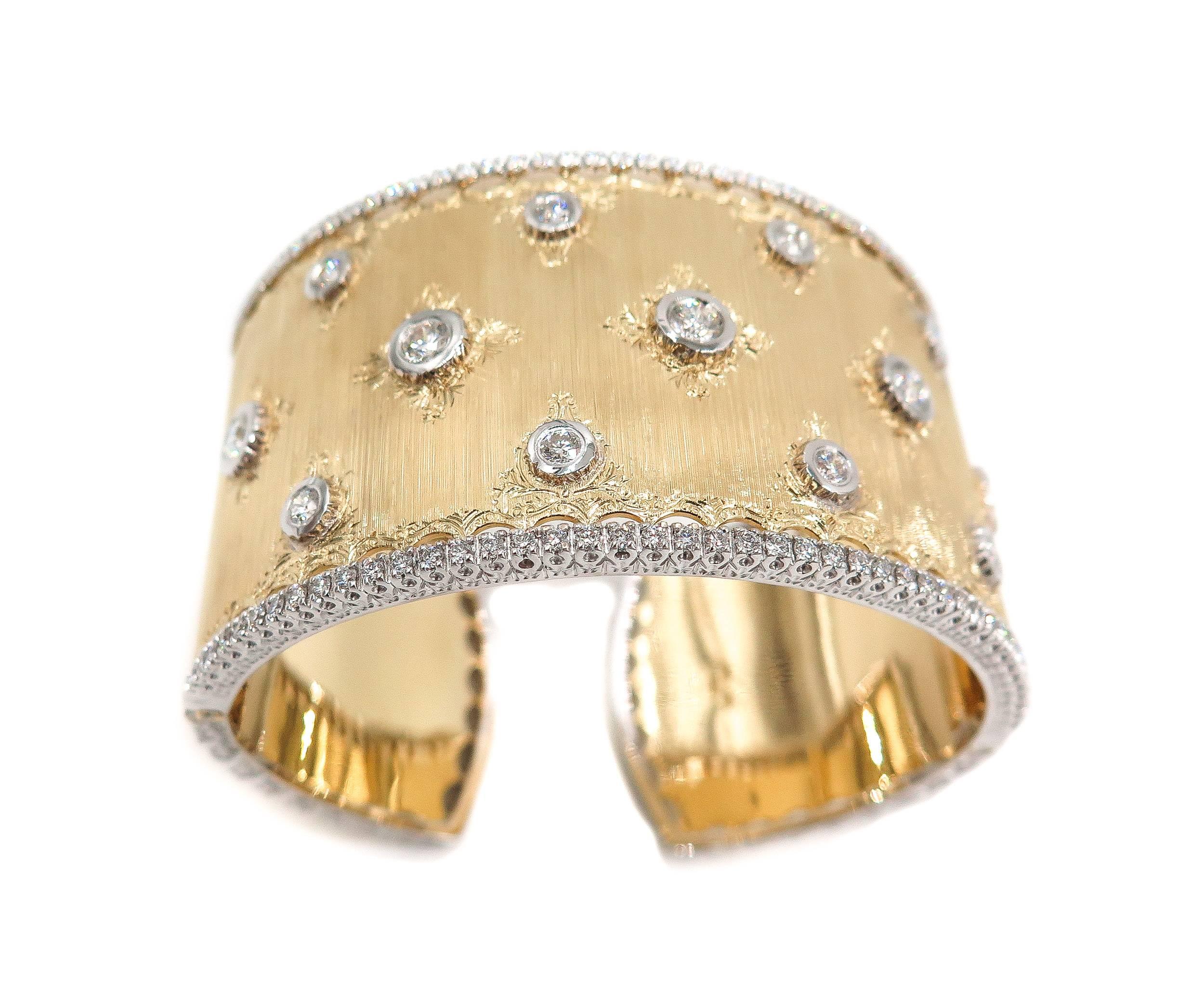 This beautiful cuff-bangle bracelet exemplifies the exquisite Italian craftsmanship with an enchanting design, florentine finish and whimsical engraved flower motif. 
This fabulous bracelet is adorned with 13 round brilliant cut diamonds bezel set