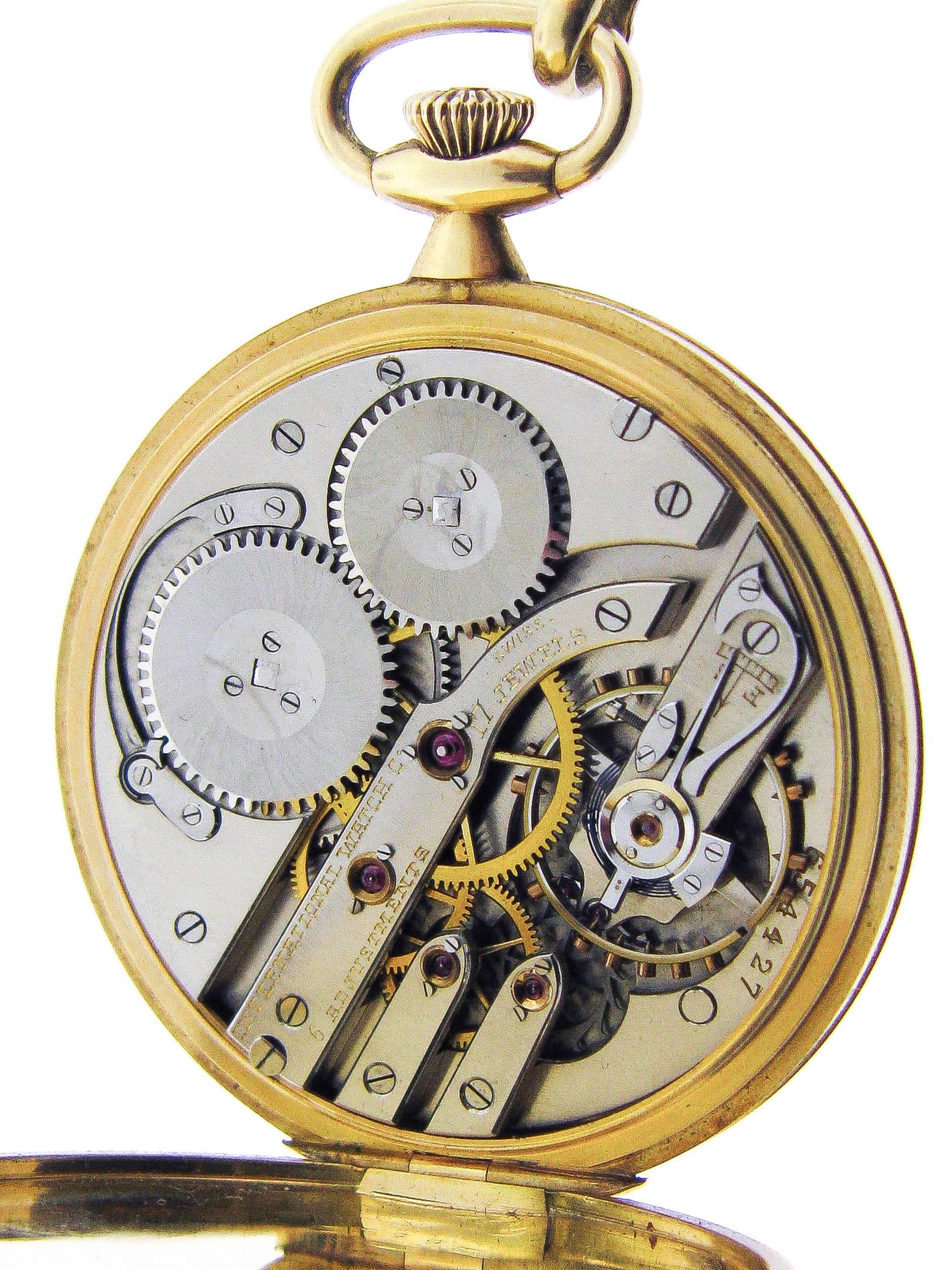 Tiffany & Co. Pocket Watch crafted in 18K yellow gold.  
The movement was produced by International Watch Co. with case number 26520 and movement number 654427 featuring 17 jewels.
Complemented by a long bar links chain.
