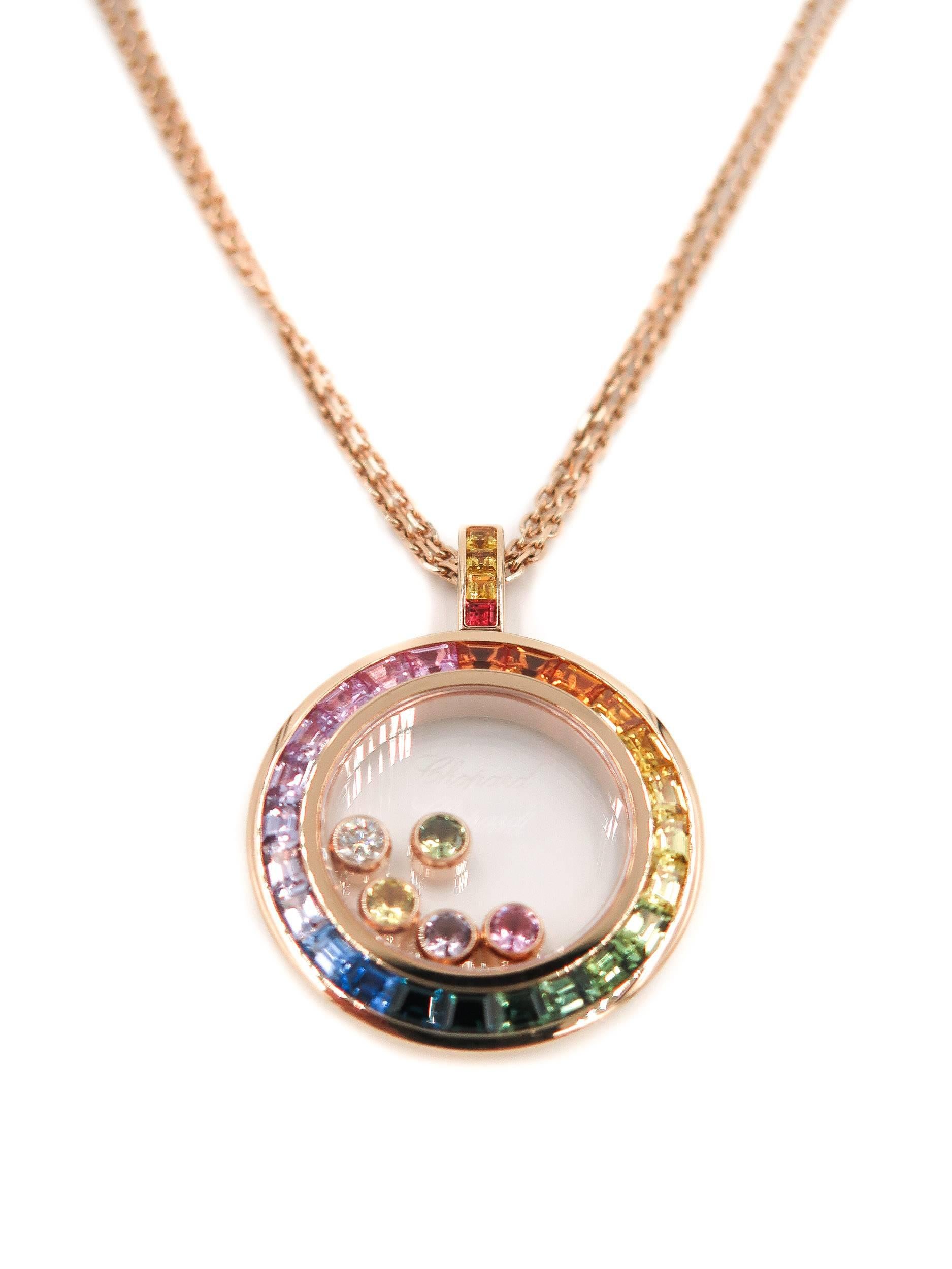 At the very heart of Chopard's jewelry collection, the Happy Diamonds are as unique as they are timeless. Inspired by sparkling drops of water in a waterfall, the five freely moving colored sapphires dance beneath a domed sapphire crystal on this