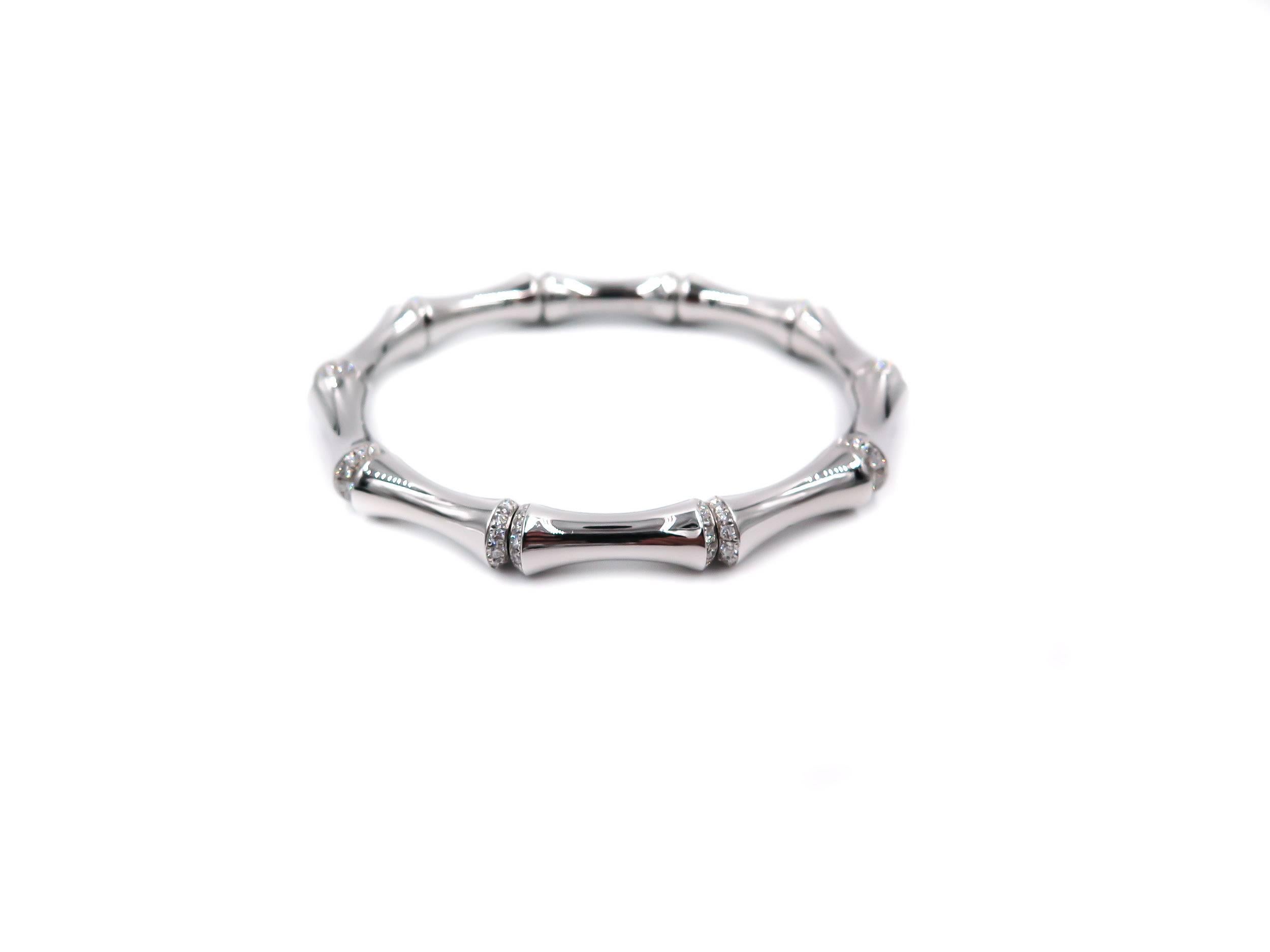 This bamboo inspired white gold and diamond bangle by Gucci is the perfect summer accessory. As versatile as it is appealing, it can be the perfect compliment to any other favorite bracelets or a statement piece in its own right. This bracelet is a