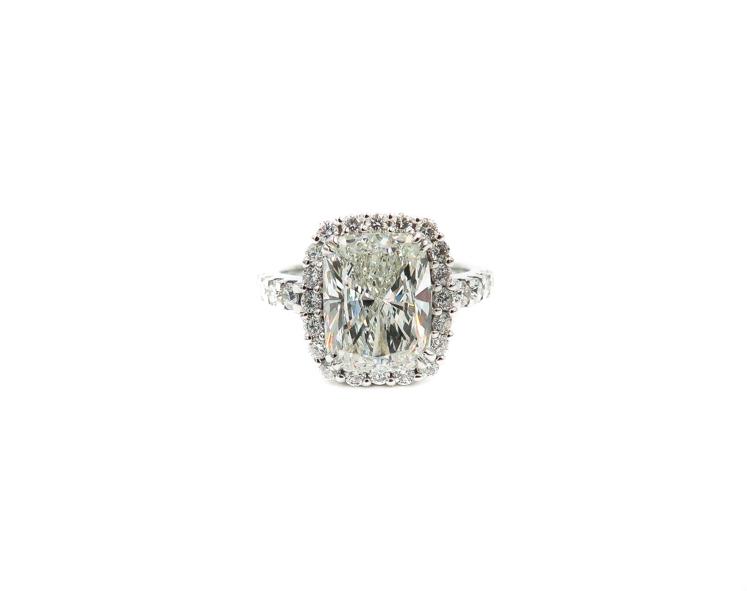 Modern  4.02 carats  GIA certified Cushion Shaped Diamond Platinum Halo Ring