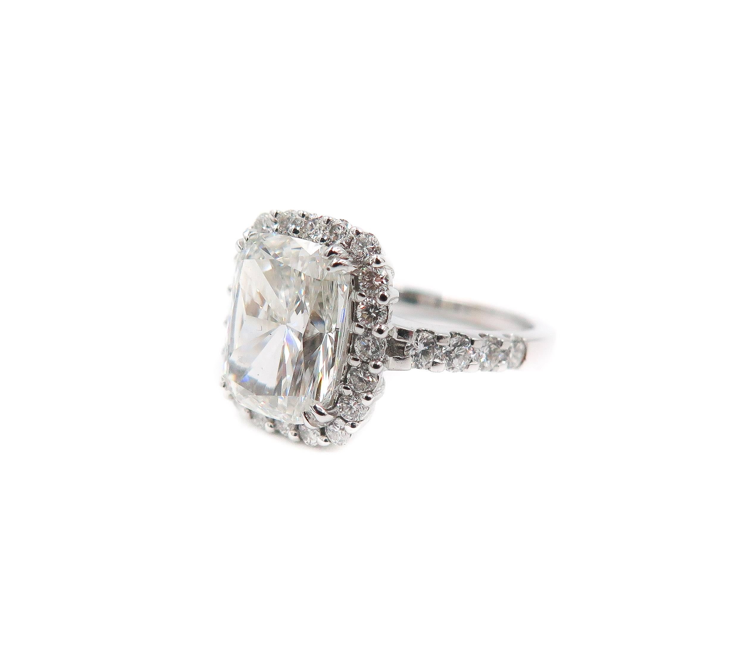  4.02 carats  GIA certified Cushion Shaped Diamond Platinum Halo Ring In New Condition In Greenwich, CT