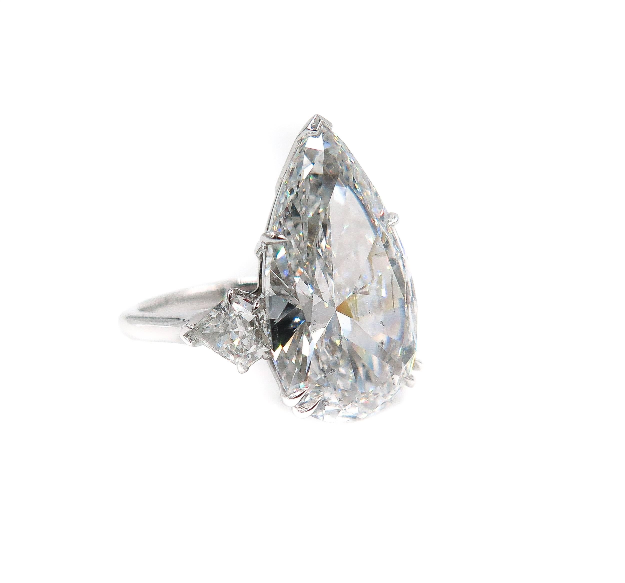 An exquisite pear shaped diamond engagement ring, handcrafted in platinum. 
The incredible beauty of this diamond will mesmerize any and all who get caught by its brilliance. Certified by GIA, the 10.07 carats is a D color, SI2 clarity.
Finger size
