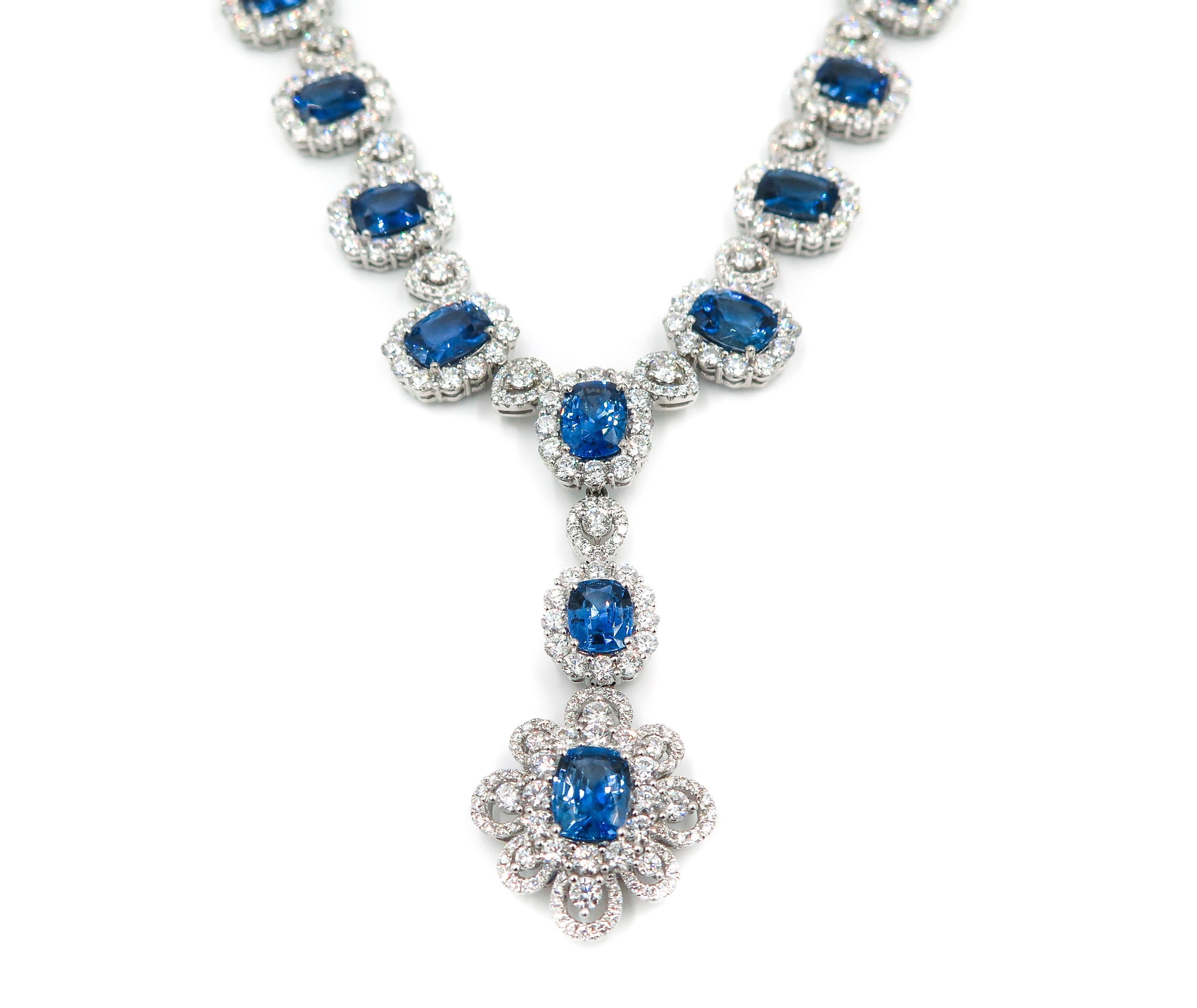 The Stylistic design of this necklace is the main feature.   
The contemporary style: classic and feminine is well expressed through the perfectly matched blue sapphires surrounded by gorgeous white diamonds.  
The center drop is removable to